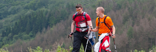 People trekking in the countryside